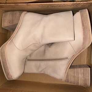 Free people heeled boots
Never worn 
With box
